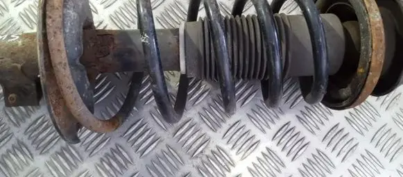 Suzuki Swift I Front coil spring
