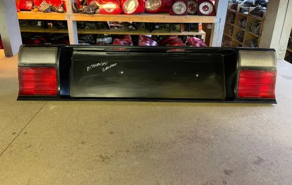 Mitsubishi Galant Trunk door license plate light bar MB567150 567150