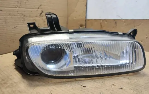 Mazda 323 F Headlight/headlamp 11061708