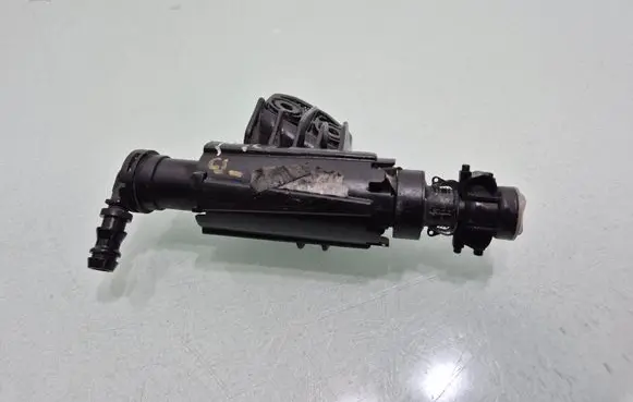 Hyundai Tucson TL Headlight washer spray nozzle 