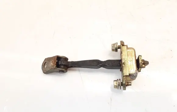 Front door check strap stopper