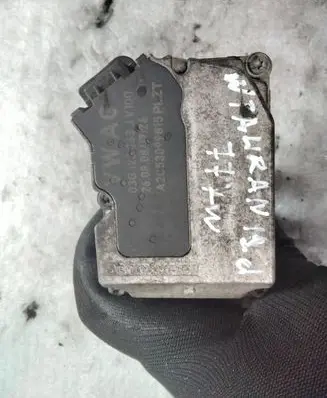 Volkswagen Touran I Throttle valve 03G128063J A2C53099815 2608081724