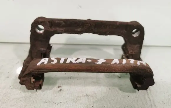 Opel Astra J Brake caliper pad carrier rear 