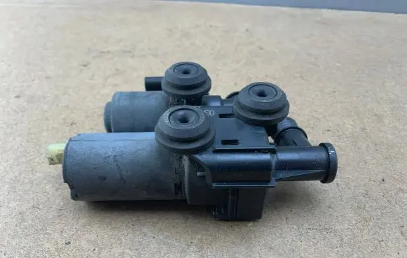 Coolant heater control valve