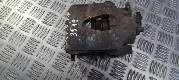 Volkswagen Golf V Front brake caliper