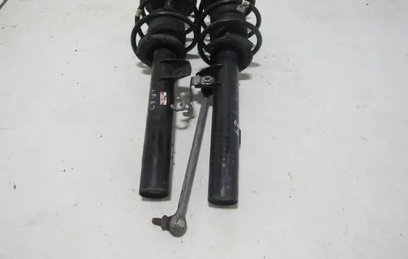 Front shock absorber with coil spring