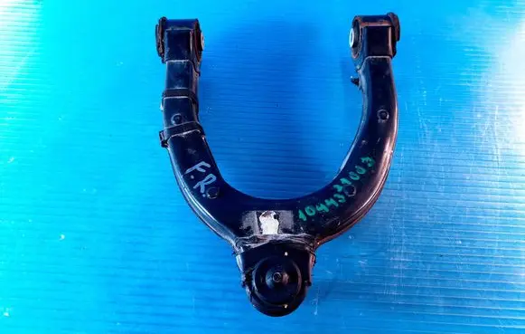 Tesla Model 3 Front upper control arm/wishbone 104432100J