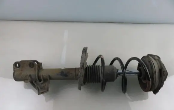 Nissan Micra Front shock absorber with coil spring 
