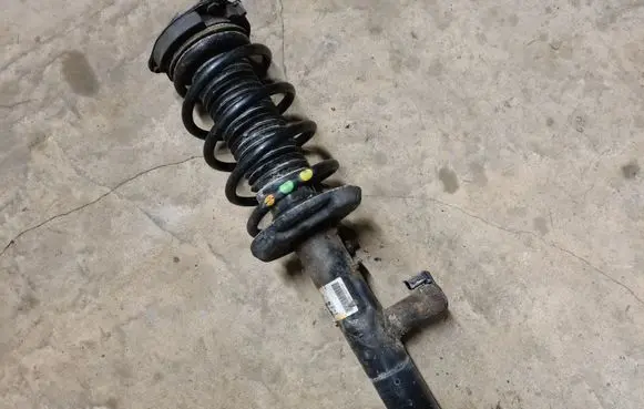 Volkswagen PASSAT CC Front shock absorber with coil spring 3C0413031D