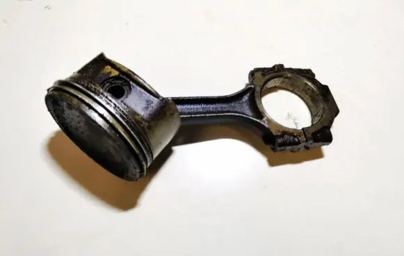 Piston with connecting rod
