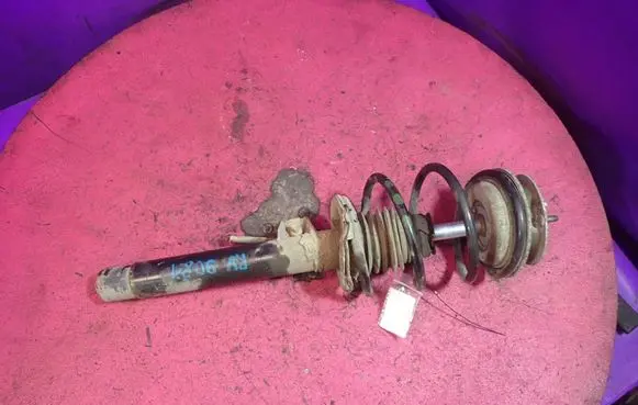 BMW X3 E83 Front shock absorber with coil spring