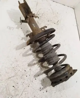 Renault Megane III Front shock absorber with coil spring