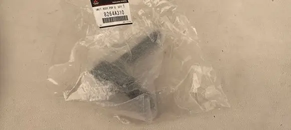 Mitsubishi Outlander Headlight washer spray nozzle 8264A310
