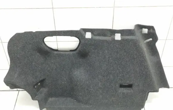 Trunk/boot lower side trim panel