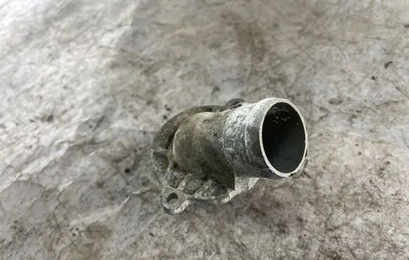 Thermostat/thermostat housing