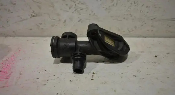 Thermostat/thermostat housing