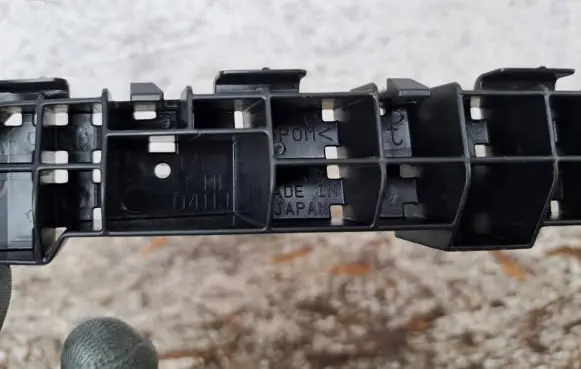 Subaru Crosstrek II Front bumper mounting bracket 57707FL060