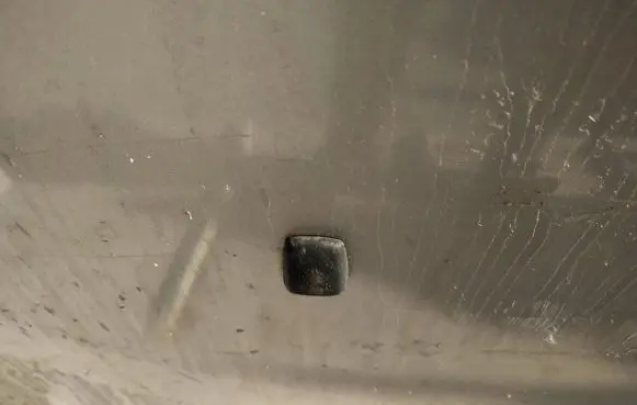 Windshield washer spray nozzle