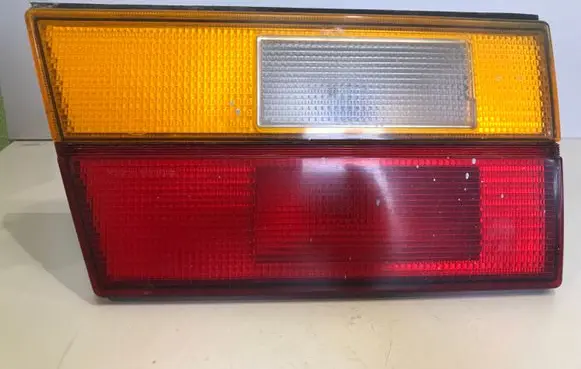 Volkswagen PASSAT B2 Tailgate rear/tail lights 321945107A