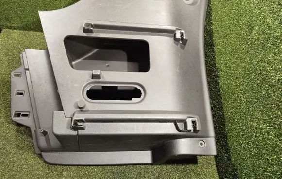 Trunk/boot lower side trim panel