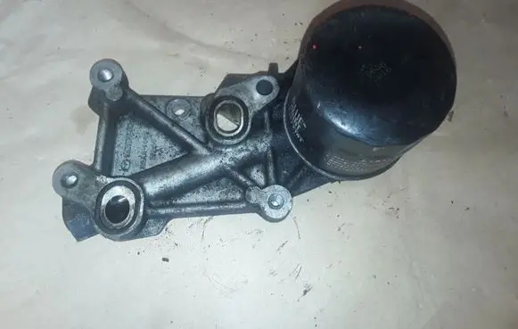 Mazda 6 Oil filter mounting bracket R2AA14311