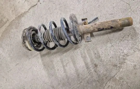 Renault Scenic III - Grand scenic III Front shock absorber with coil spring