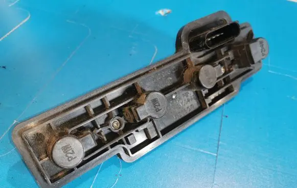 Volkswagen Caddy Tail light bulb cover holder 2K0945258A