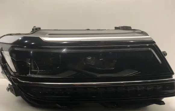 Volkswagen Tiguan Headlight/headlamp 03110123605 5NN941082C