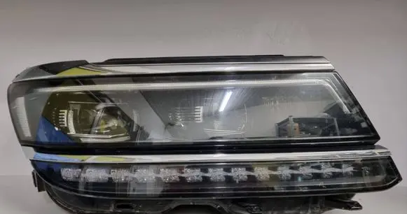 Volkswagen Tiguan Headlight/headlamp 5NB941082D 0301101236