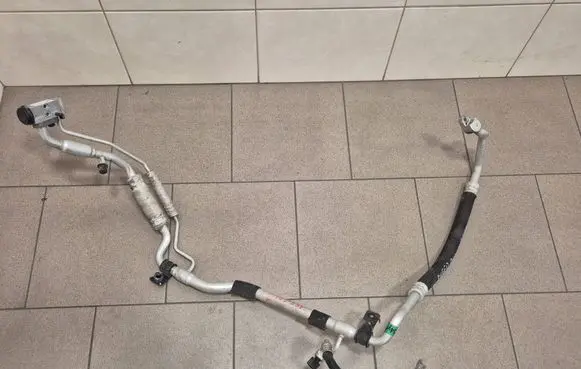 KIA Xceed Air conditioning (A/C) pipe/hose 97775G4650