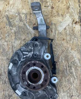 Front wheel hub spindle knuckle