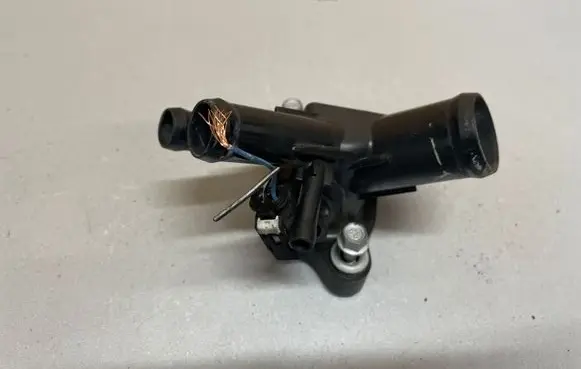 Thermostat/thermostat housing