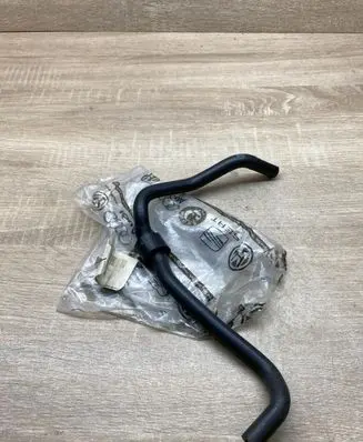 Volkswagen Touran I Engine coolant pipe/hose 1K0121447DH