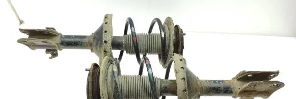 Subaru Legacy Front shock absorber with coil spring 20310AG490