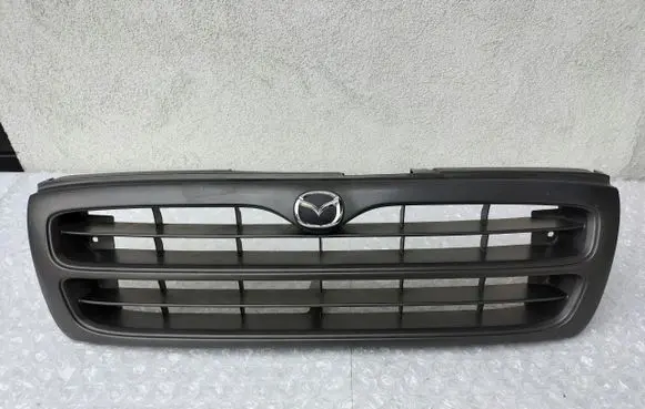 Mazda B2500 Front bumper upper radiator grill