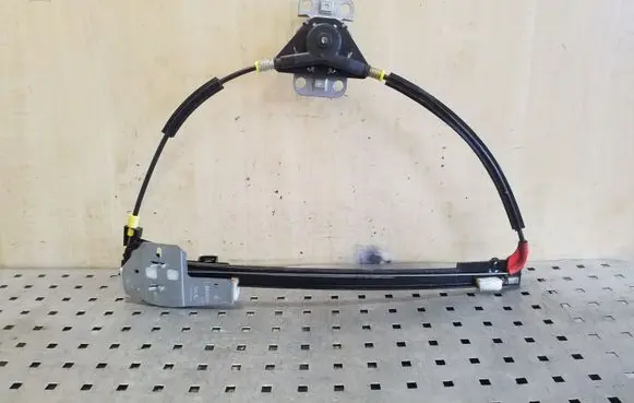 Rear door manual window regulator