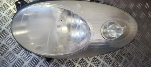Nissan Micra Headlight/headlamp 89007103 26060AX600