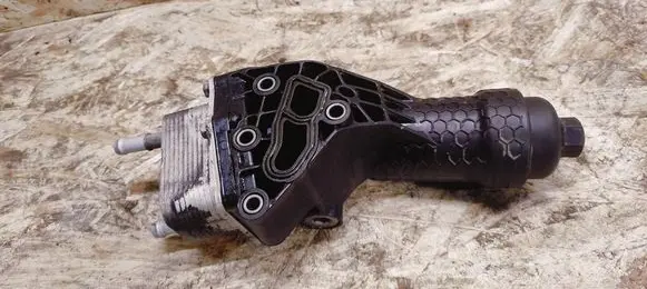 Oil filter mounting bracket