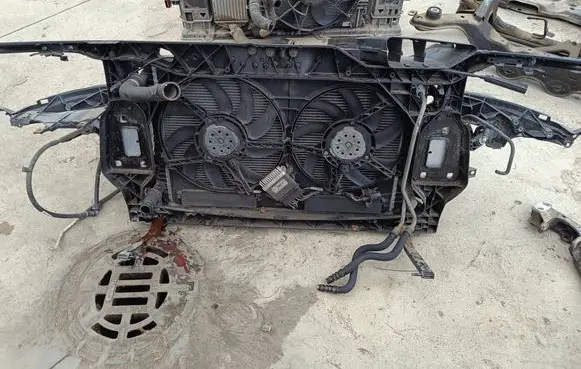 Radiator support slam panel