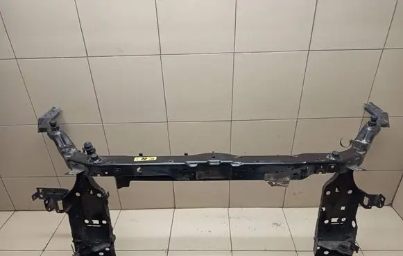 Radiator support slam panel