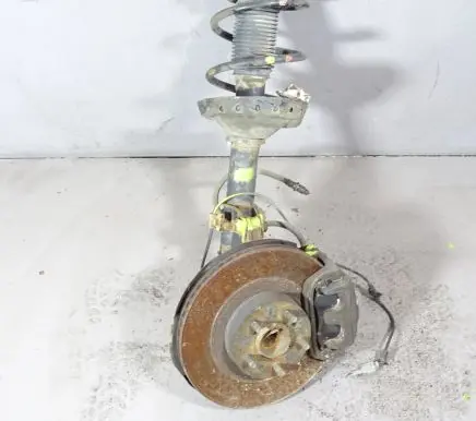 Subaru Legacy Front shock absorber with coil spring