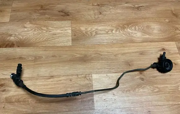 Volkswagen PASSAT B6 Clutch pipe/line 1K0721468A