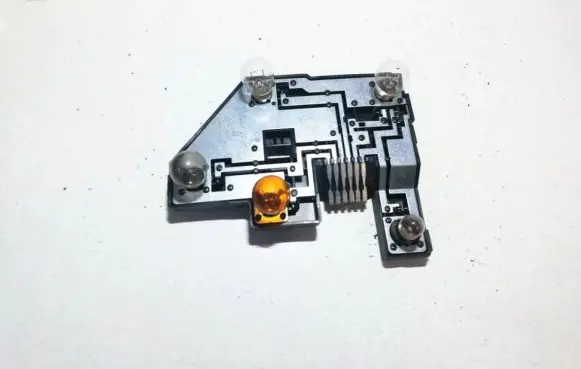 Tail light bulb cover holder