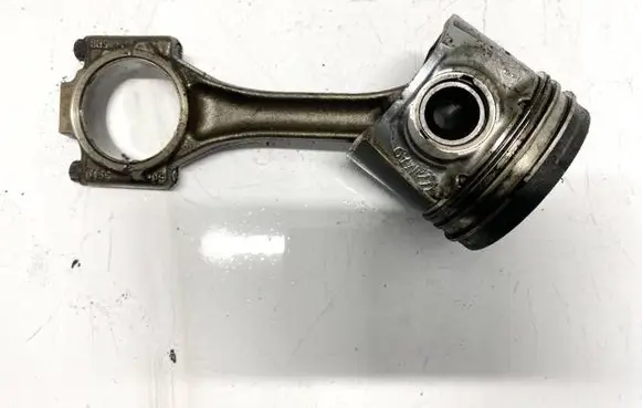 Piston with connecting rod
