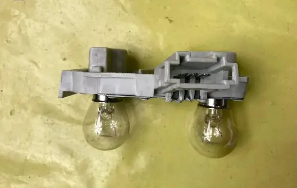 Mercedes-Benz B W245 Tail light bulb cover holder A1698200677