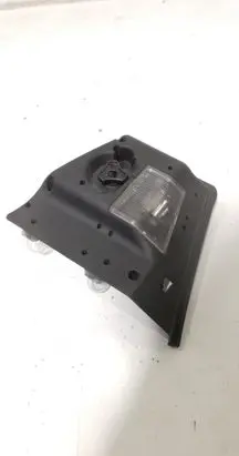 Tail light bulb cover holder