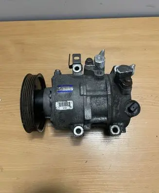 KIA Sportage Air conditioning (A/C) compressor (pump) 1037E05400 17203659