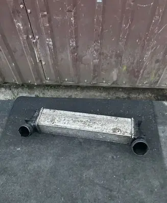 BMW 3 E90 E91 Intercooler radiator 7798788 3296399