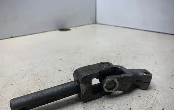 Volkswagen PASSAT B4 Steering column universal joint 1H0419955