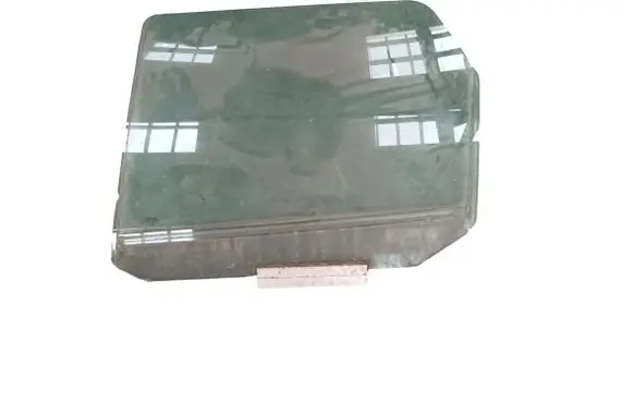 Ford Escort Rear door window glass 1112059